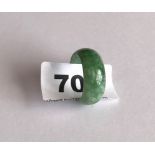 An old polished jade wedding style ring of good colour and larger ring size. Band width 1cm.