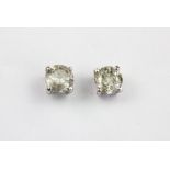 A pair of 18ct white gold (stamped 750) stud earrings set with brilliant cut diamonds, approx. 0.