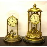 Two vintage torsion pendulum clocks, one without dome, tallest overall H. 40cm. Condition - Good,