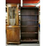 A contemporary mahogany veneered bookcase and a glazed corner cabinet, bookcase size 90 x 170cm.