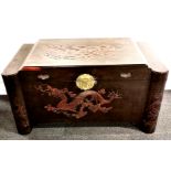A carved wooden Chinese chest, 103x 54 x 55cm.
