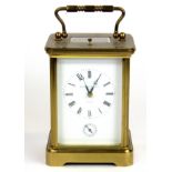 A Matthew Norman gilt brass striking repeater carriage clock, H. 18cm. Condition - Very clean but