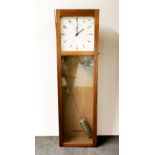 An ITR (International Time Recording Ltd) electronic wall clock, H. 138cm.