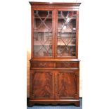 A mahogany veneered display cabinet, 185 x 90 x 32cm.