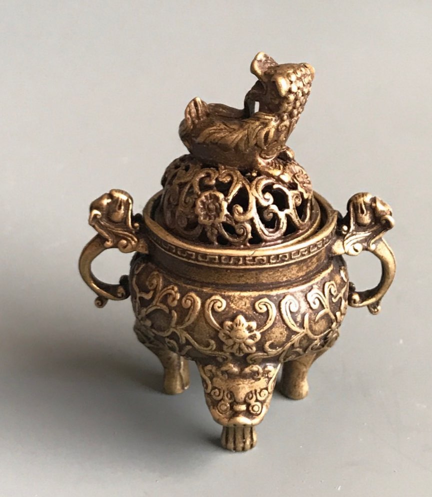 An early 20th Century Chinese polished bronze/brass censer with elephant head handles, H. 30cm. - Image 3 of 3