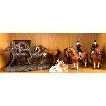 A quantity of Beswick porcelain and other horse figures.