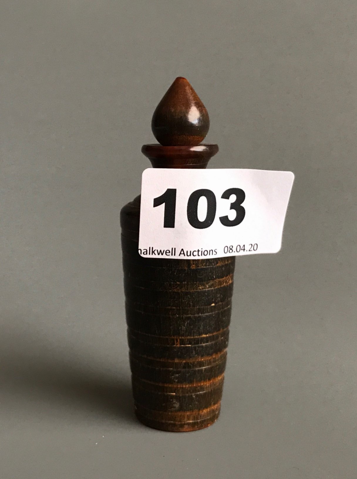A ribbed turned cattle horn snuff bottle with original stopper typical of the type carried by