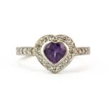 A 9ct white gold ring set with heart cut amethyst and diamonds, (P).