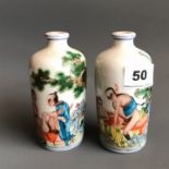 A pair of erotic decorated Chinese porcelain table snuff bottles. H. 12cms. Condition good but no