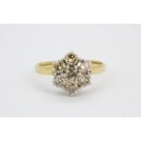 An 18ct yellow gold brilliant cut diamond set cluster ring, (approx. 1.53ct overall).