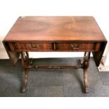 A mahogany veneered console table with lyre legs, extended 150 x 50 x 75cm.