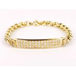 An 18ct yellow gold (stamped 750) ID bracelet set with brilliant cut diamonds, L. 15cm.