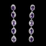 A pair of 925 silver drop earrings set with oval cut amethysts and white stones, L. 5.5cm.