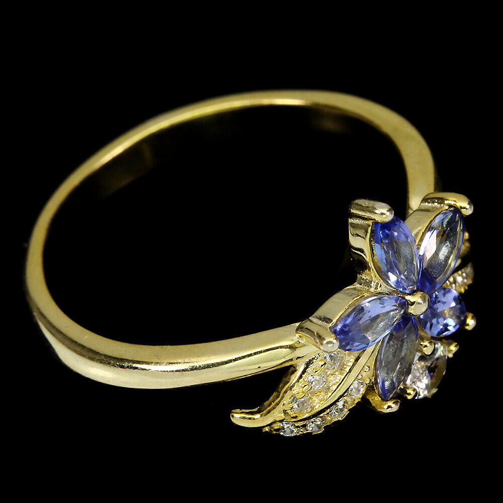 A 925 silver gilt flower shaped ring set with marquise cut tanzanites and white stones, (Q). - Image 2 of 2