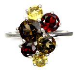 A 925 silver ring set with smokey quartz, citrine and garnets, (O).