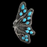 A 925 silver and marcasite brooch set with turquoise, 7 x 3cm.