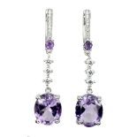 A pair of 925 silver drop earrings set with oval cut amethysts and white stones, L. 4.3cm.