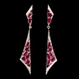 A pair of 925 silver rose gold gilt drop earrings set with oval cut rubies and white stones, L.