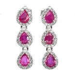 A pair of 925 silver drop earrings set with pear cut rubies and cubic zirconia, L. 2.5cm.