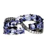 A 925 silver tanzanite and white stone set ring, (N.5).