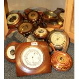 A quantity of vintage barometers.