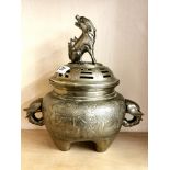 A 19th / early 20th century Chinese cast bronze/ brass censer with elephant head handles, H. 30cm.