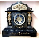 A 19th century French gilt mounted slate and granite striking mantle clock, H. 50cm. Condition: case