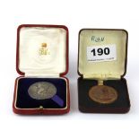 A 1928 cased investiture medal for Prince Edward of Wales together with a 1953 Coronation medal.
