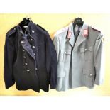 Two vintage uniform jackets.