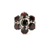 A 925 silver garnet set cluster ring, (Q).