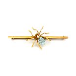 A yellow metal (tested high carat gold) spider shaped bar brooch set with a pearl and an oval cut