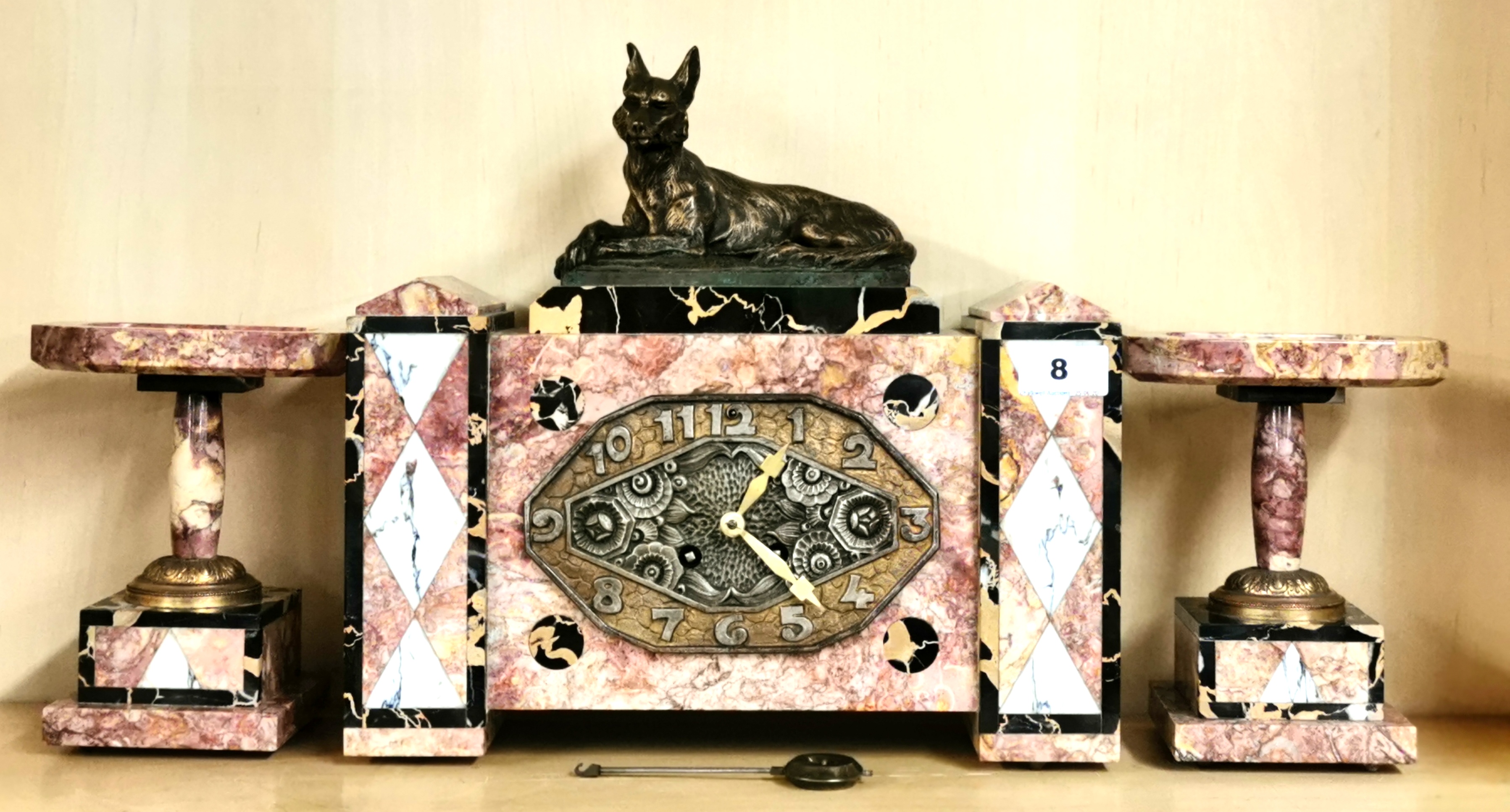 An Art Deco three piece marble clock garniture, H. 32cm. Condition: understood to be in good working