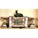 An Art Deco three piece marble clock garniture, H. 32cm. Condition: understood to be in good working