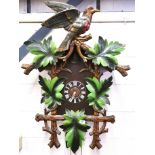 A very large mid 20th century carved wooden cuckoo clock, H. 107cm. Condition: working condition