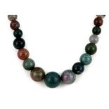 A polished agate bead graduated necklace, L. 44cm.