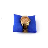 A Michael Kors rose gold coloured fashion wrist watch.