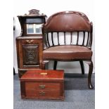 An Edwardian mahogany tub chair, a mahogany cutlery cabinet and a purdonium.