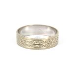 A 9ct white gold wedding band, approx. 2.1gr, (O).