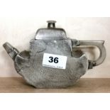 A Chinese pewter overlaid terracotta teapot with jade spout and handles, H. 11cm. Condition :