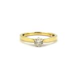 A 9ct yellow gold diamond set solitaire ring, (M).