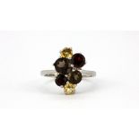 A 925 silver ring set with smoky quartz, citrine and garnets, (O).