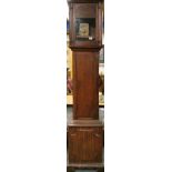 An early oak longcased clock case and part movement, H. 210cm.