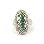 A 925 silver emerald and white stone set ring, (M).