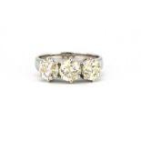 An 18ct white gold (stamped 750) ring set with three brilliant cut diamonds, approx. 2.44ct overall,