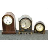 Two 1920's chinoiserie decorated wooden mantle clocks and one other.