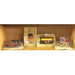 Four French reproduction tin toys.