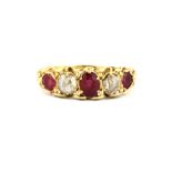 An antique 15ct yellow gold (stamped 15ct) ring set with old cut rubies and rose cut diamonds, (M.