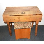 A Victorian pine drop leaf kitchen table, W. 88cm, together with a blanket box / stool.