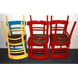 Six painted kitchen chairs.