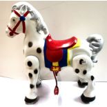 A 1950's metal Mobo toy horse, H. 75cm.